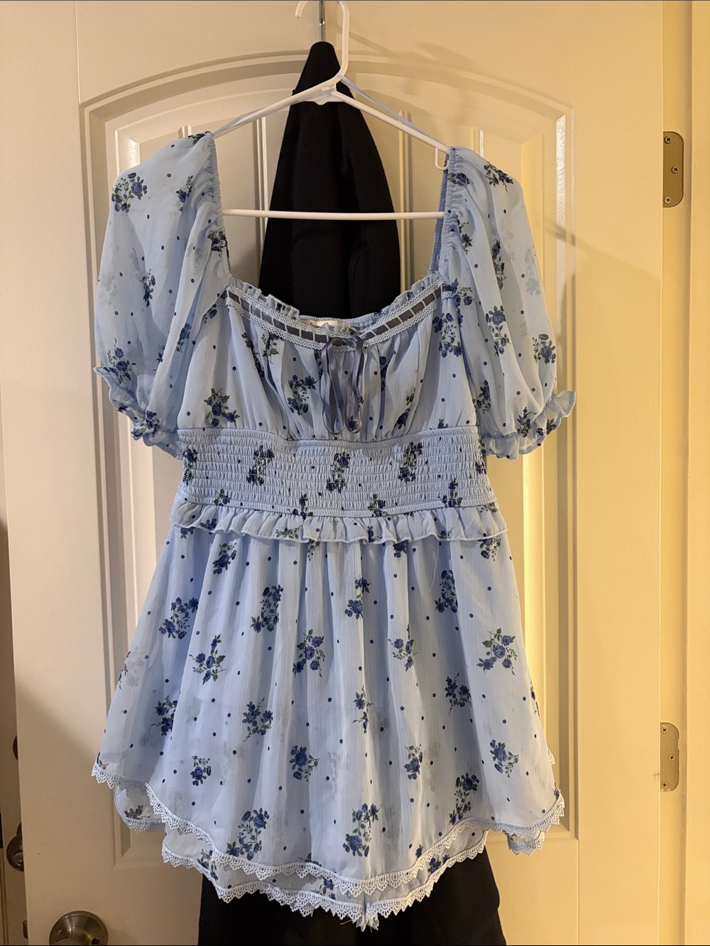 Francesca's Collections Light Blue Floral Smocked romper